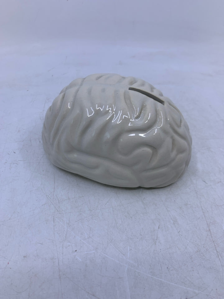 CREAM CERAMIC BRAIN COIN BANK.