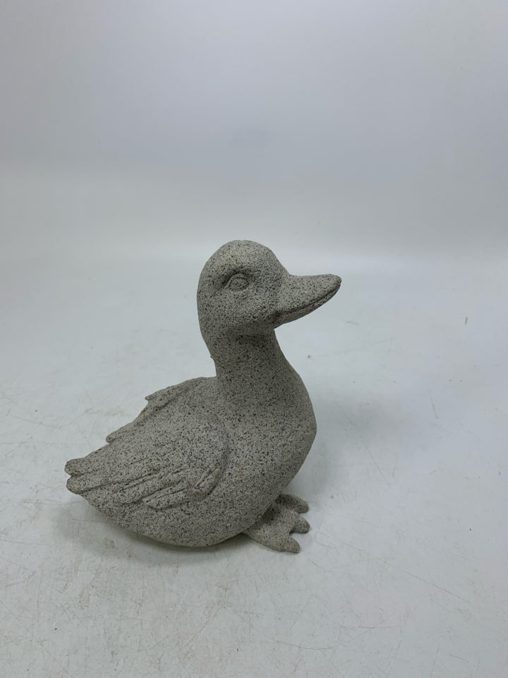CEMENT DUCK W/ TEXTURED WING FEATHERS.
