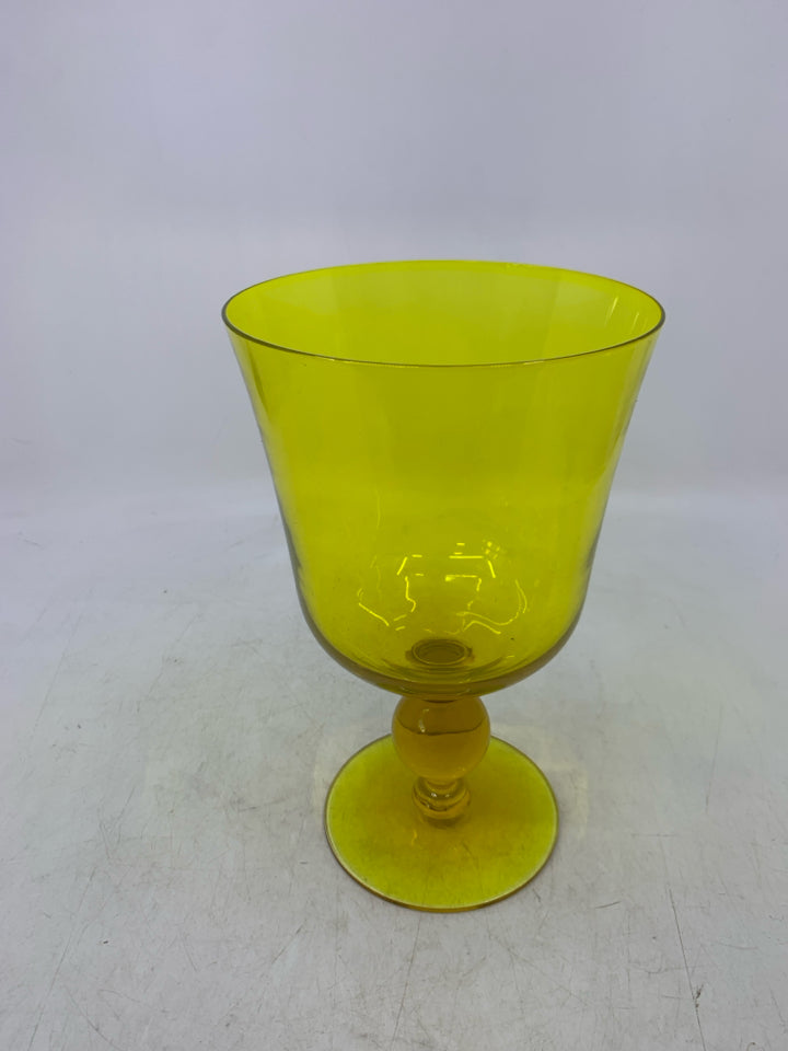FOOTED THIN GLASS YELLOW PILLAR CANDLE HOLDER.