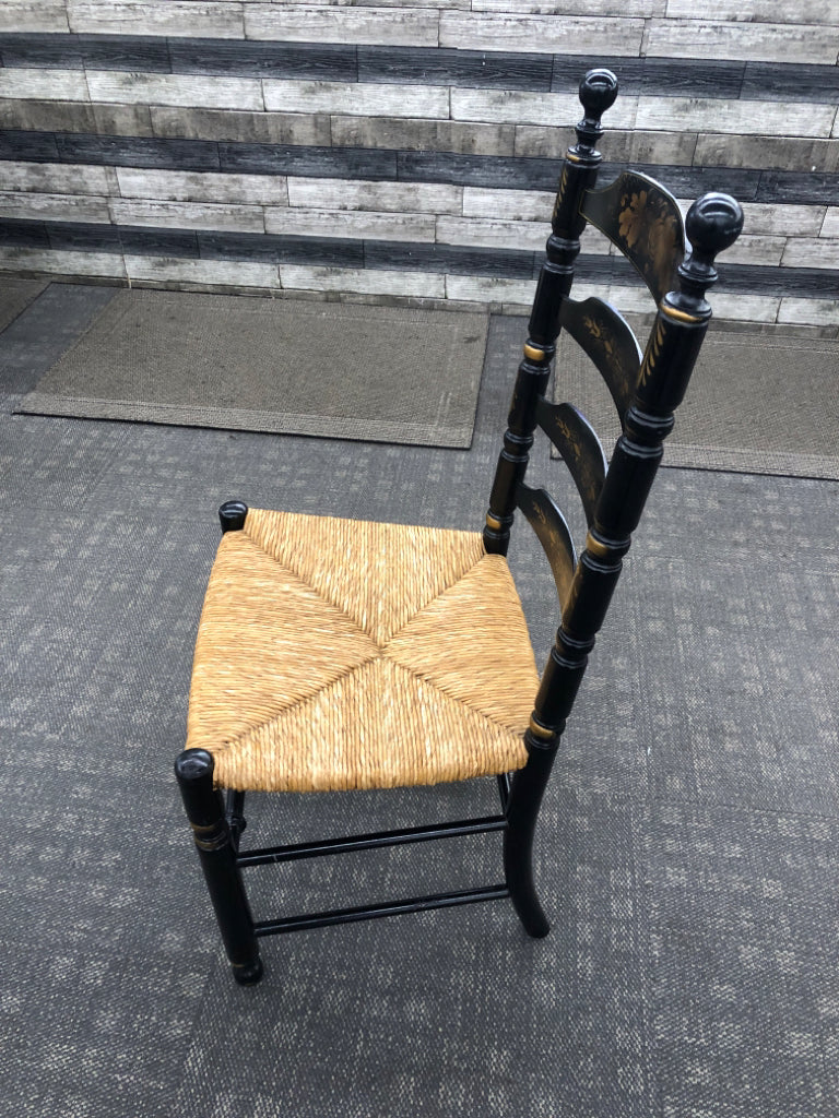 LADDER BACK CHAIR W/HARVEST PATTERN AND WOVEN SEAT.