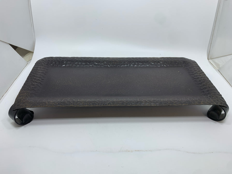 HAMMERED METAL RAISED DISPLAY TRAY.