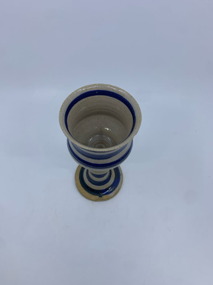 BLUE/BEIGE STRIPED POTTERY CANDLE HOLDER.