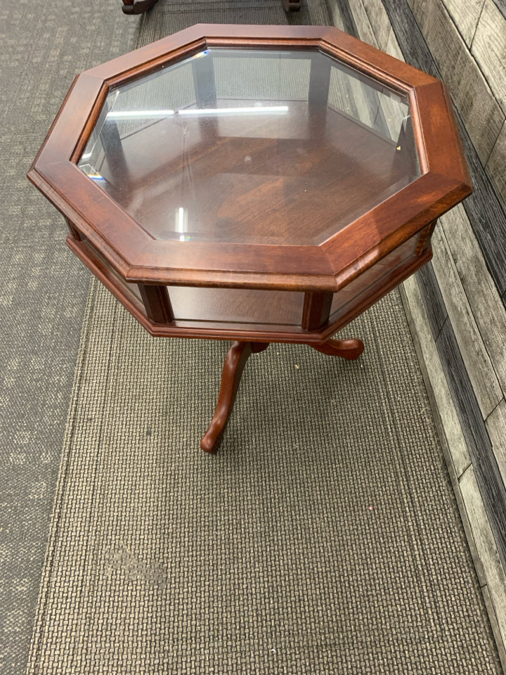 BUTLER HEXAGON SHAPED DARK WOOD DISPLAY TABLE.