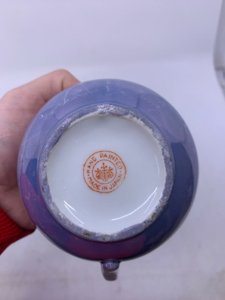 BLUE IRIDESCENT W/ ORANGE INSIDE.