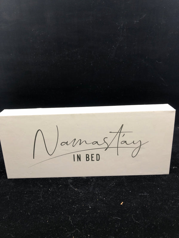 NAMASTAY IN BED WHITE BLOCK SIGN.