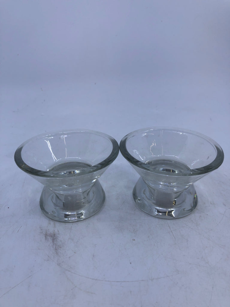 2 SMALL GLASS CANDLE HOLDERS.