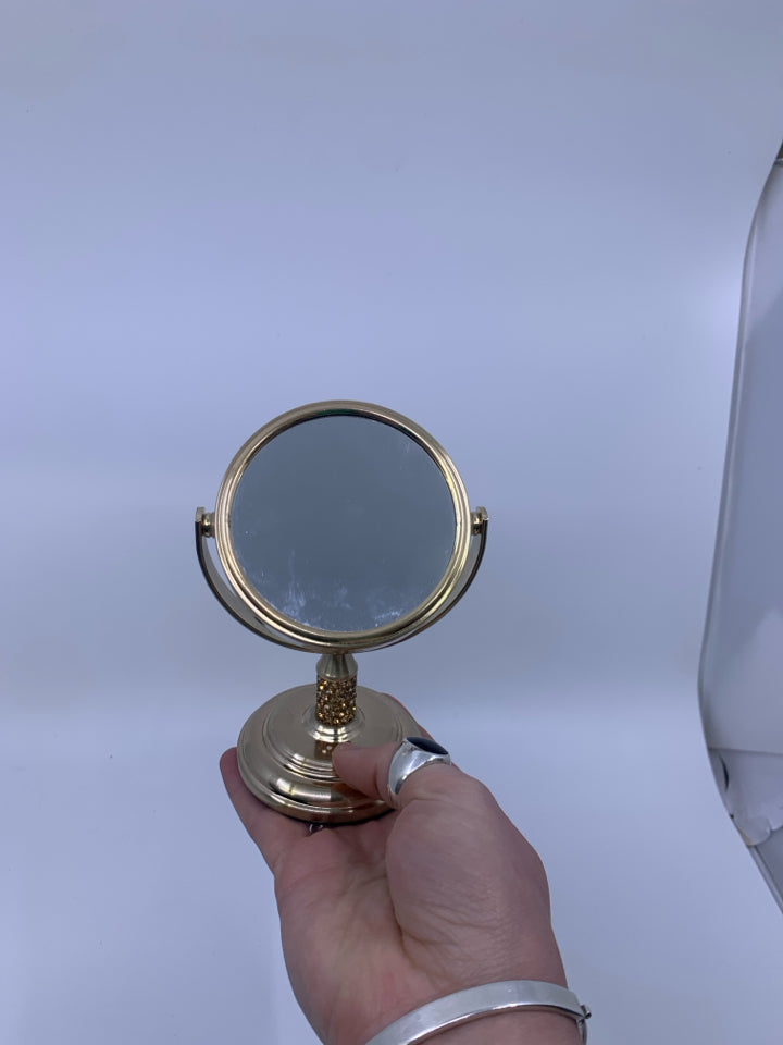 SMALL GOLD MIRROR.