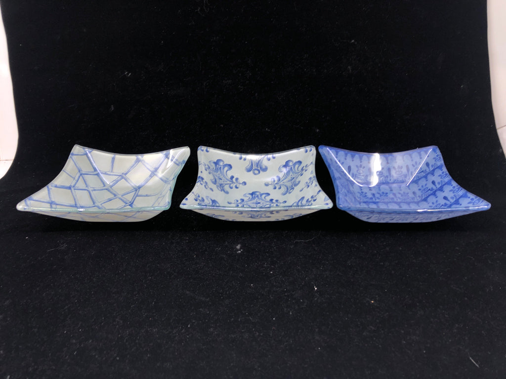 3 GLASS SQUARE BOWLS W/ ASSORTED BLUES PATTERNS.