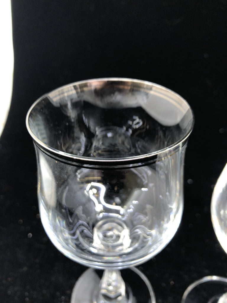 4 SILVER RIM WINE GLASSES.