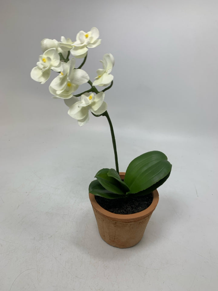 SMALL TERRA COTTA PLANTER W/ FAUX ORCHID.