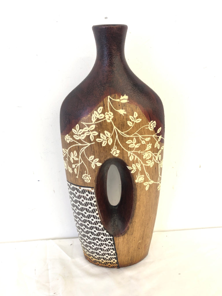 FAUX WOOD CERAMIC FLOOR VASE W FLOWER DESIGN AND HOLE IN THE CENTER.