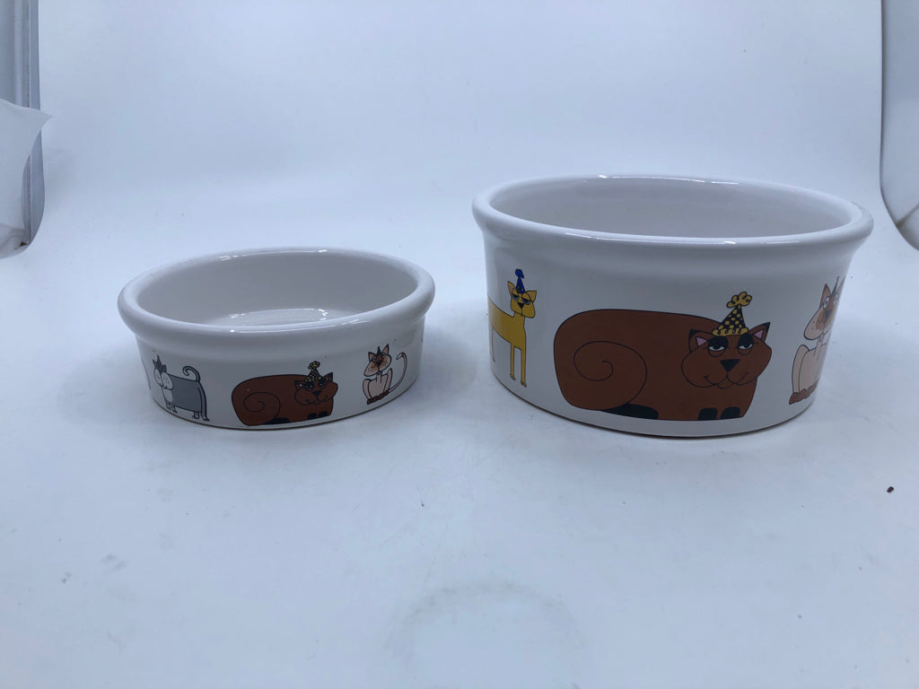 2 NESTING CAT DISHES W DIFFERENT TYPES OF CATS.