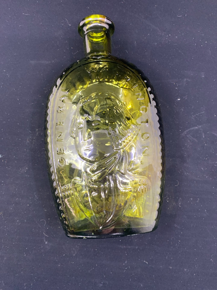 VTG GREEN GLASS EMPTY BOTTLE W EMBOSSED FACE.