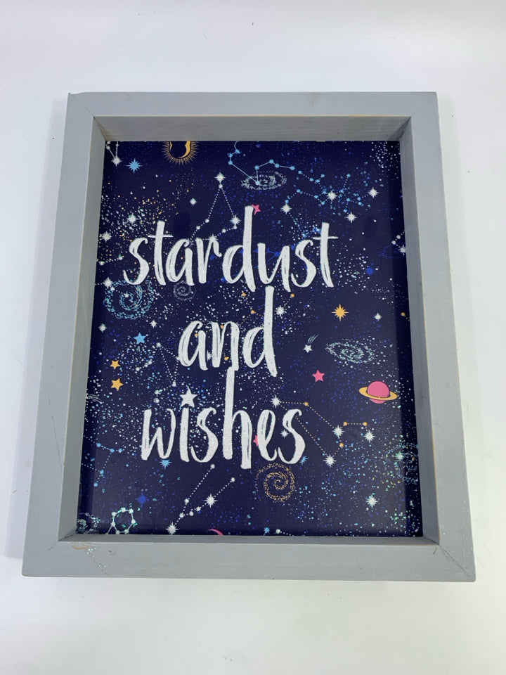 "STARDUST AND WISHES" IN GRAY FRAME.