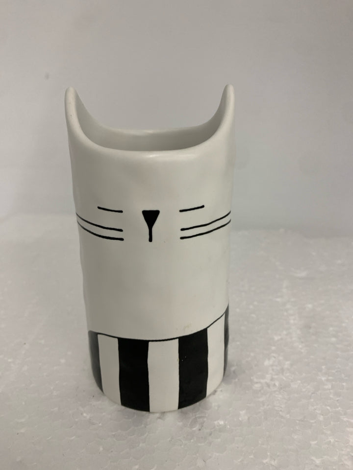 WHITE CERAMIC CAT SHAPED PENCIL CUP BLACK STRIPES.