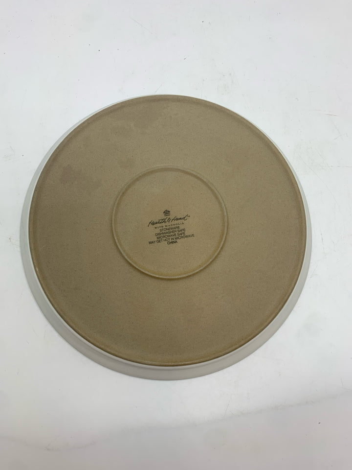 4 WHITE STONEWARE PLATES W/RED DOTTED RIM.