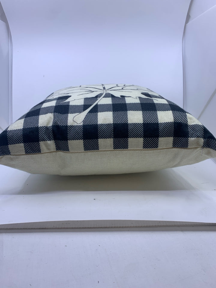 BLACK AND CREAM LEAF PILLOW.