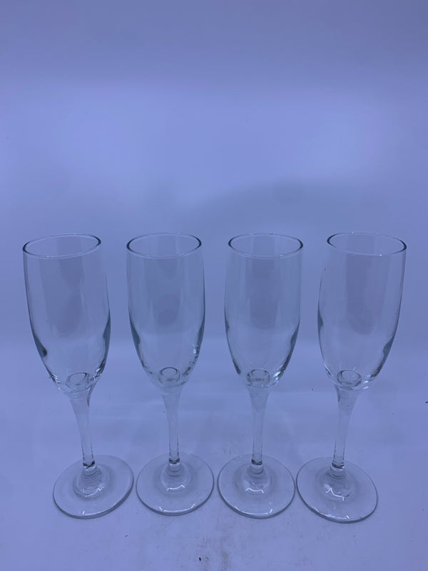 4 CHAMPAGNE GLASSES.