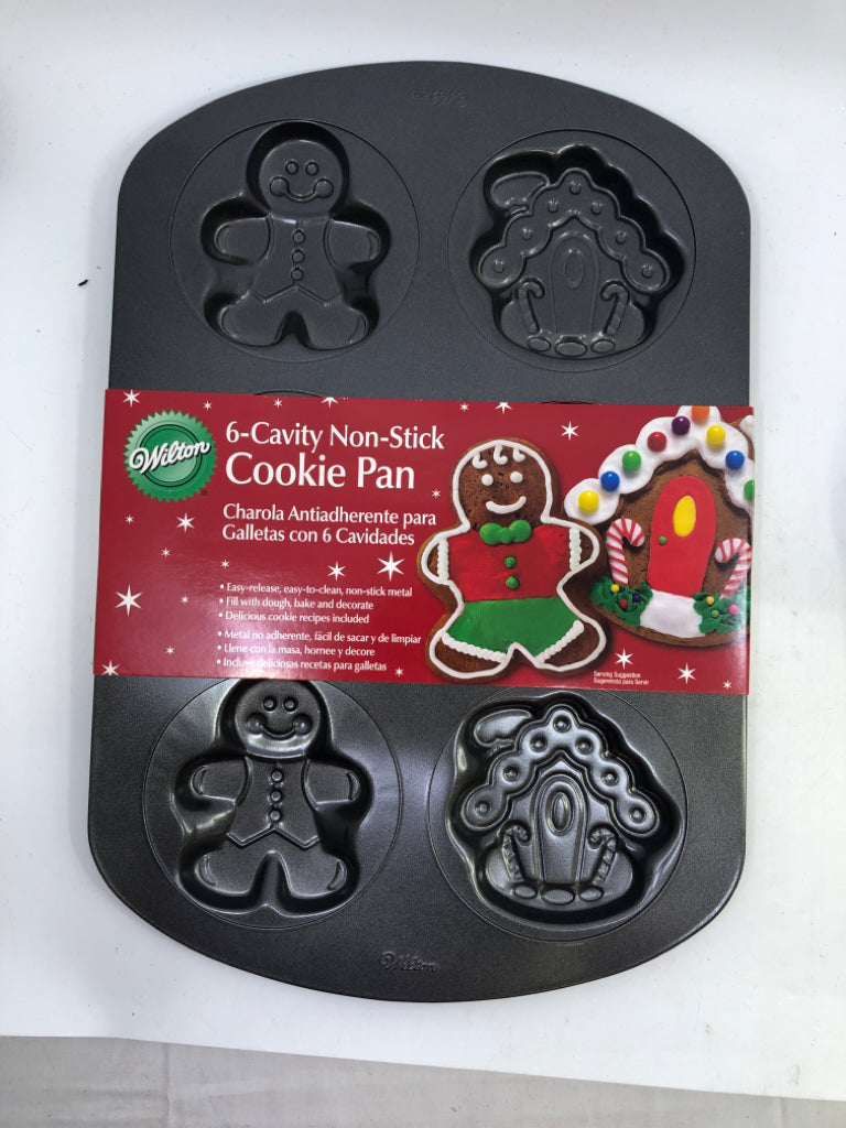 NIP WILTON GINGERBREAD HOUSE/MAN PAN.