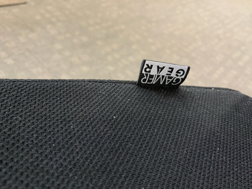 BLACK GAMER GEAR CHAIR WITH FOOT REST.