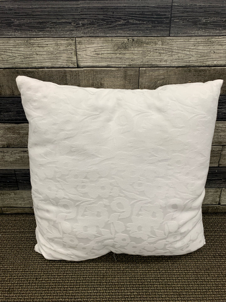WHITE FLORAL THROW PILLOW.