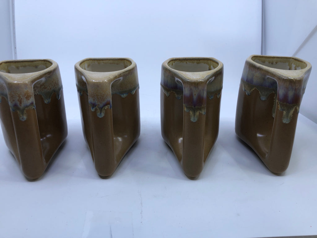 4 LARGE TAN DRIP POTTERY MUGS.