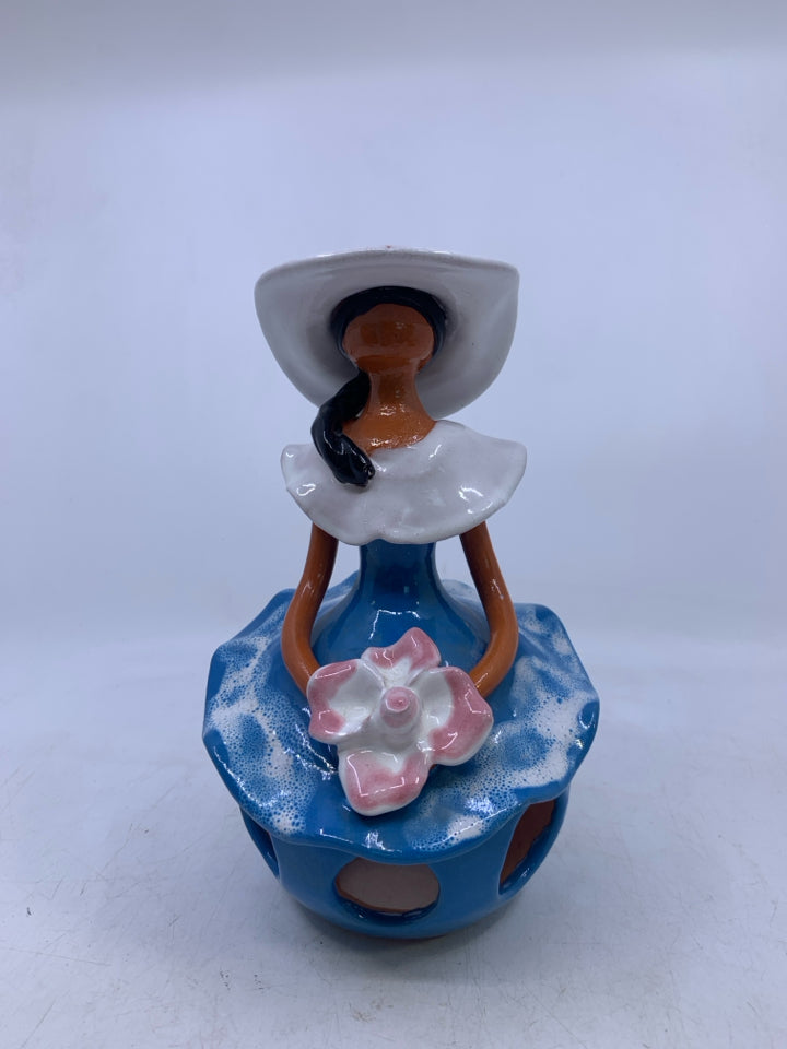 CLAY FACELESS WOMAN W/ BLUE DRESS W/ HOLES + WHITE HAT.