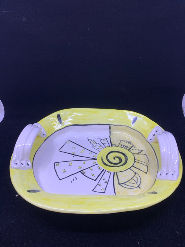 YELLOW AND WHITE CITYSCAPE SERVING BOWL WITH HANDLES.
