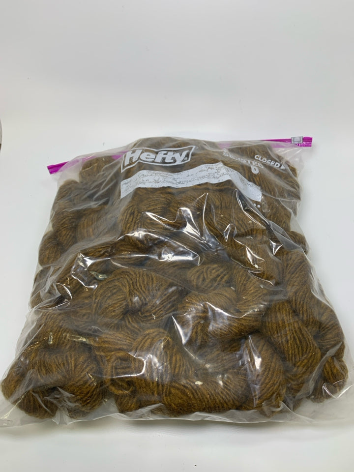 LARGE BAG OF BROWN WOOL YARN.