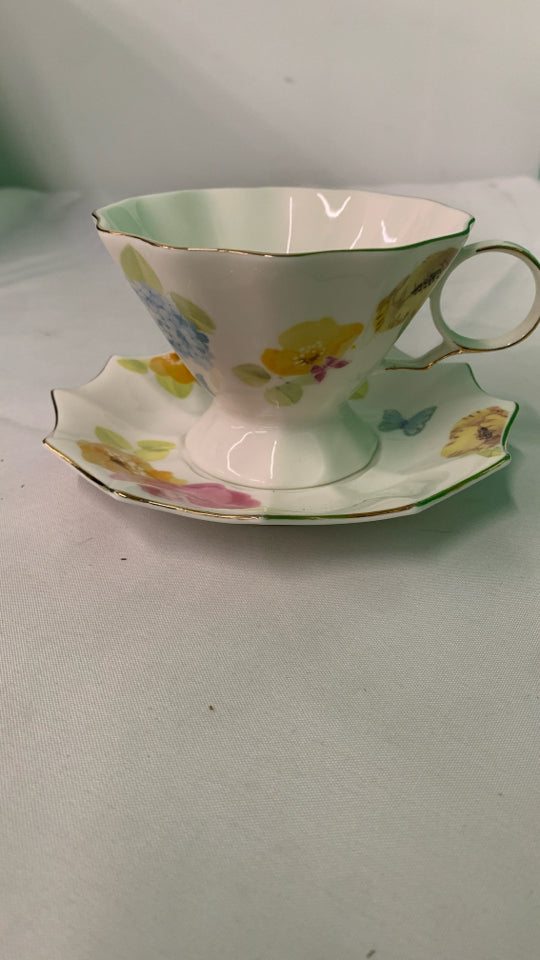 COLORFUL FLORAL TEACUP AND SAUCER.