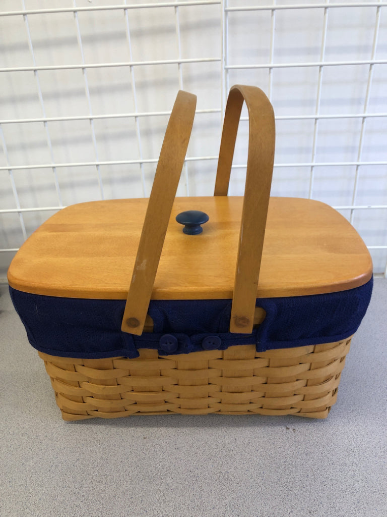 2012 NAVY LINED PICNIC BASKET W/LID, SWING HANDLES.