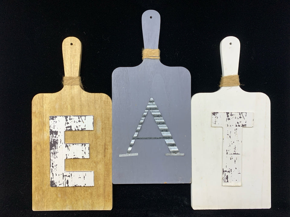 EAT CUTTING BOARD WALL HANGING.
