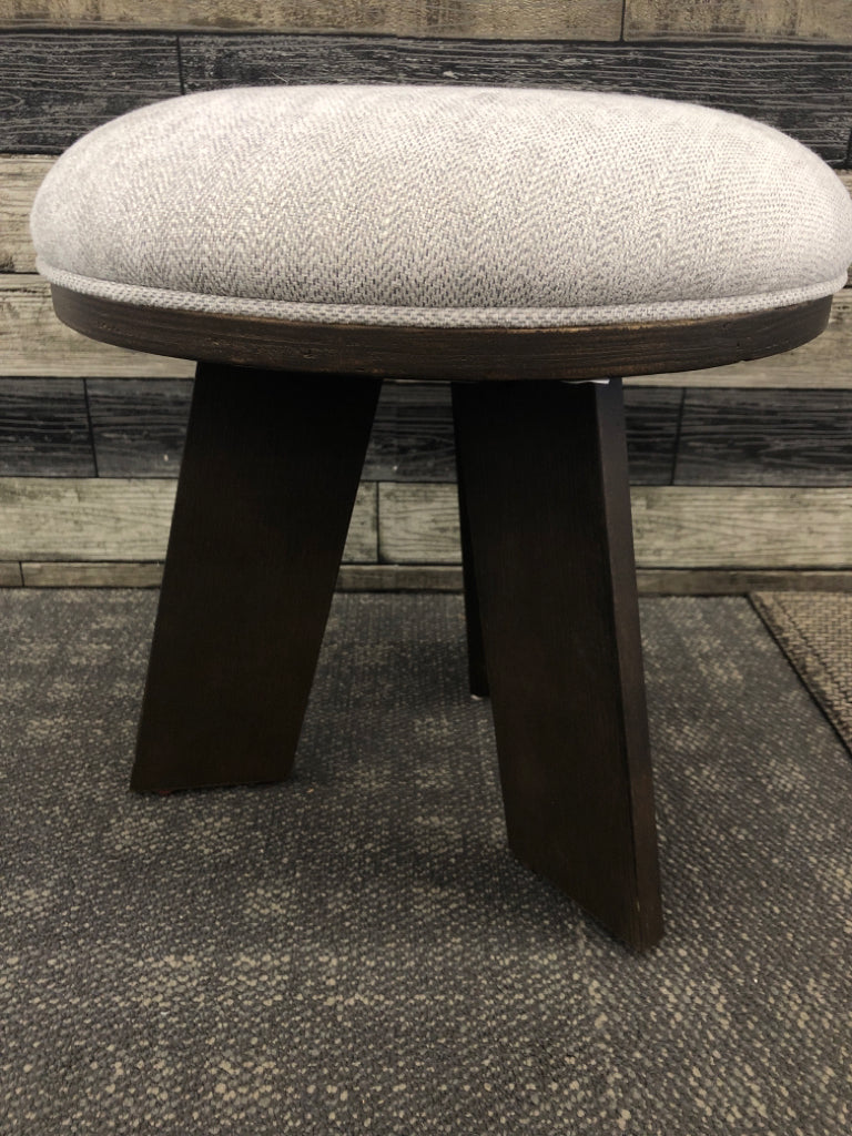 3 LEGGED DARK WOOD STOOL W/ GREY CUSHION.