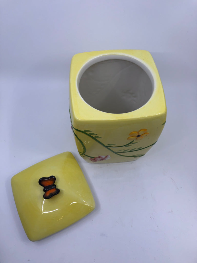 YELLOW FLORAL W BUTTERFLY CANISTER.
