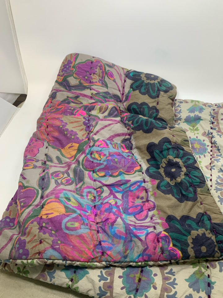 QUILTED FLORAL BODY PILLOW SHAM.