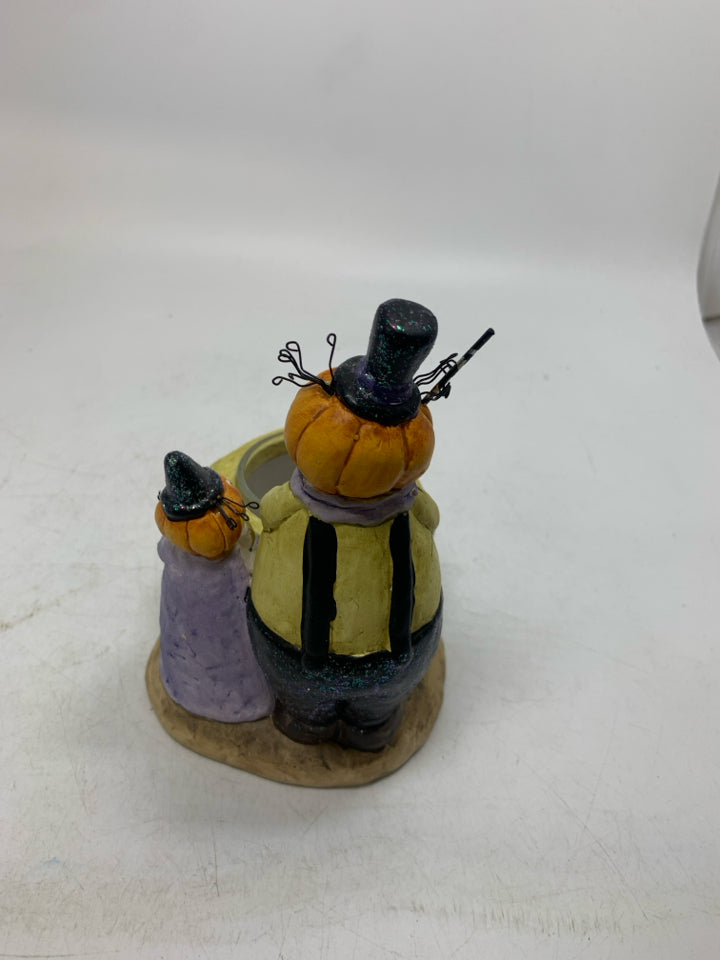 YANKEE CANDLE 2 PUMPKIN HEADS W/ CAULDRON CANDLE HOLDER.