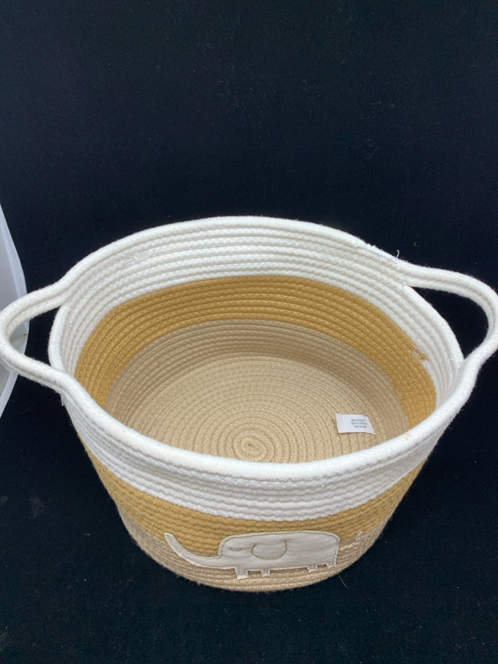 WHITE/TAN FABRIC STORAGE BIN W/ELEPHANT DECAL AND HANDLES.