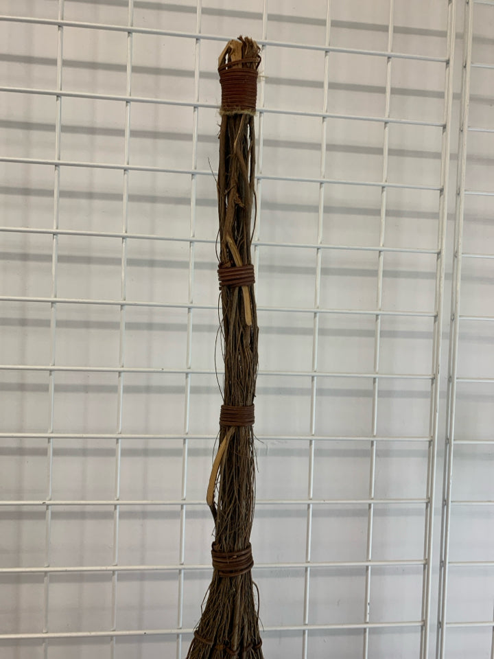 BROWN TWIG BROOM DECOR.