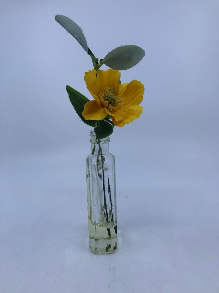 FAUX YELLOW FLOWER IN GLASS VASE.