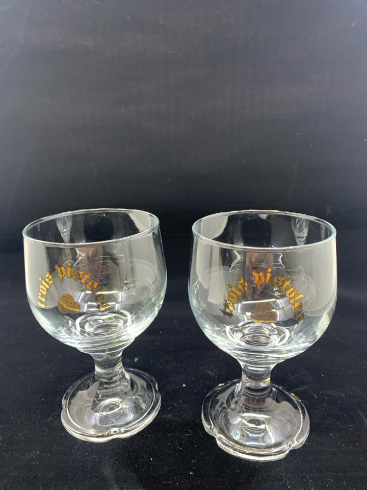 2 TROIS PISTOLES FOOTED GOBLETS.