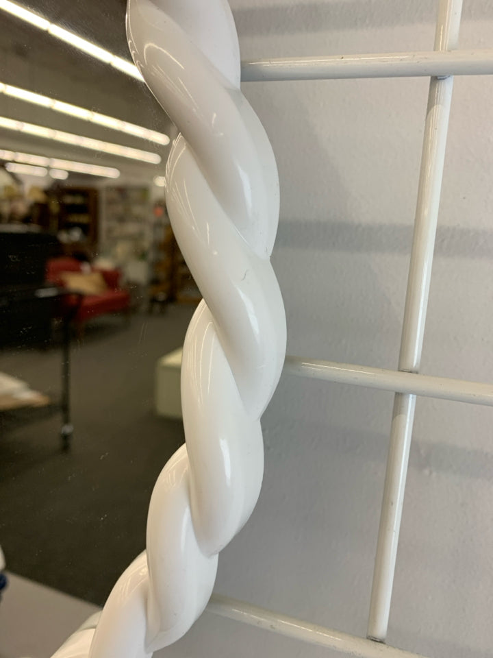 CIRCLE MIRROR W/WHITE PLASTIC BORDER.