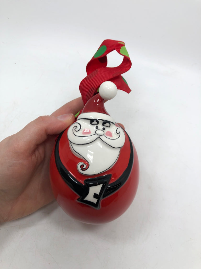 FAMILY BELIEVES IN SANTA RED SANTA ORNAMENT.