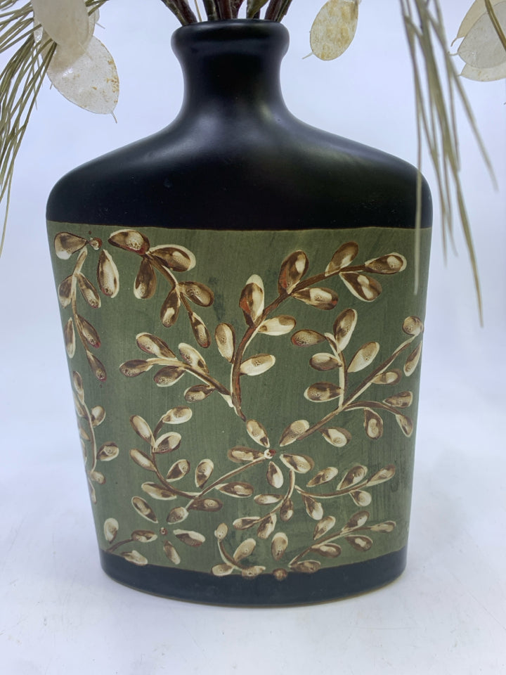 BLACK VASE/GREEN CREAM LEAF DESIGN W/ SILVER IRIDESCENT LEAVES.