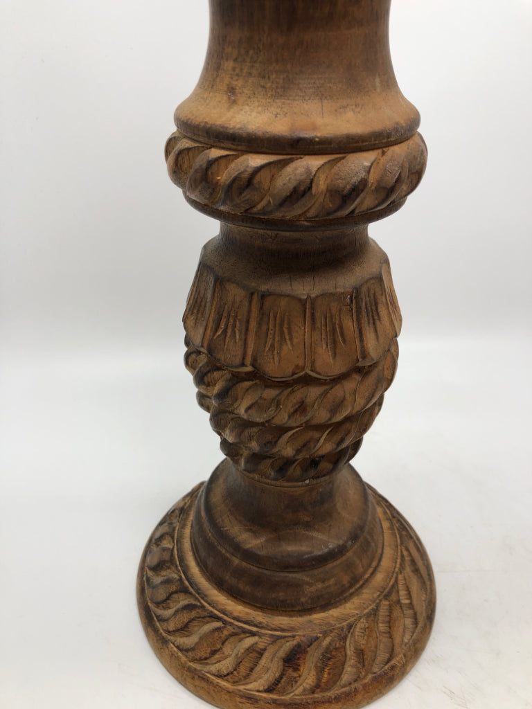 2 WOOD CARVED CANDLE HOLDERS W/BURNT FINISH.