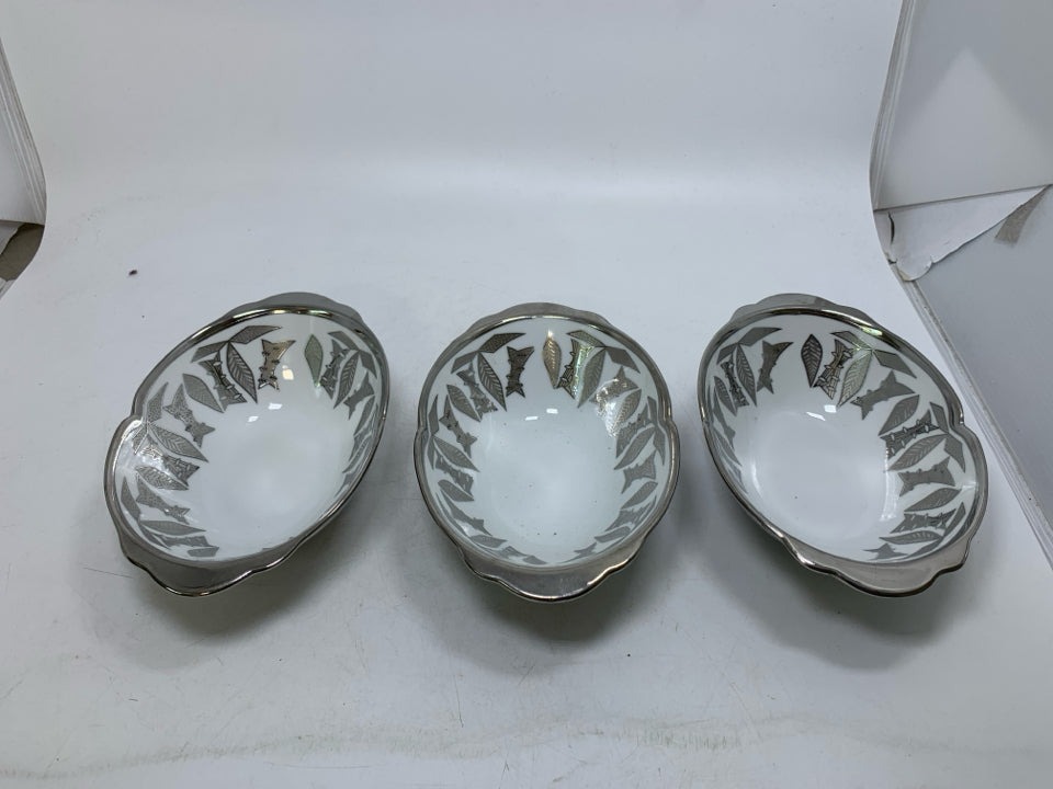 3 OVAL SOOGO BOWLS W/ SILVER DETAILS.