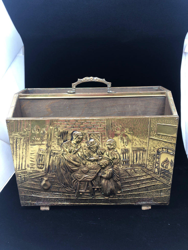 VTG BRASS MAGAZINE HOLDER W/EMBOSSED DESIGN FAMILY BAKING IN COTTAGE.