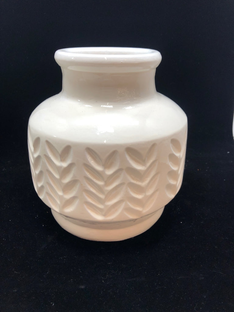 WHITE GLAZED TERRA COTTA PLANTER W/LEAF DESIGN.