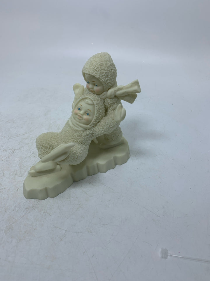 2 BABIES SKATING SNOWBABIES.