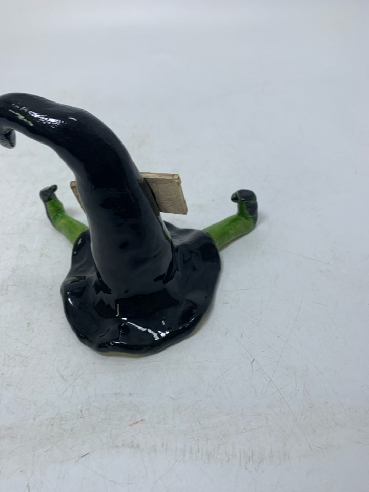 POTTERY WITCH HAT W/ GREEN LEGS IM MELTING FIGURE.
