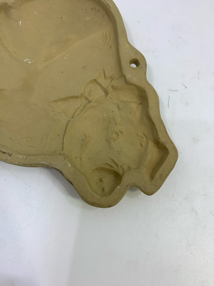 BROWN BAG CERAMIC PIG COOKIE MOLD.